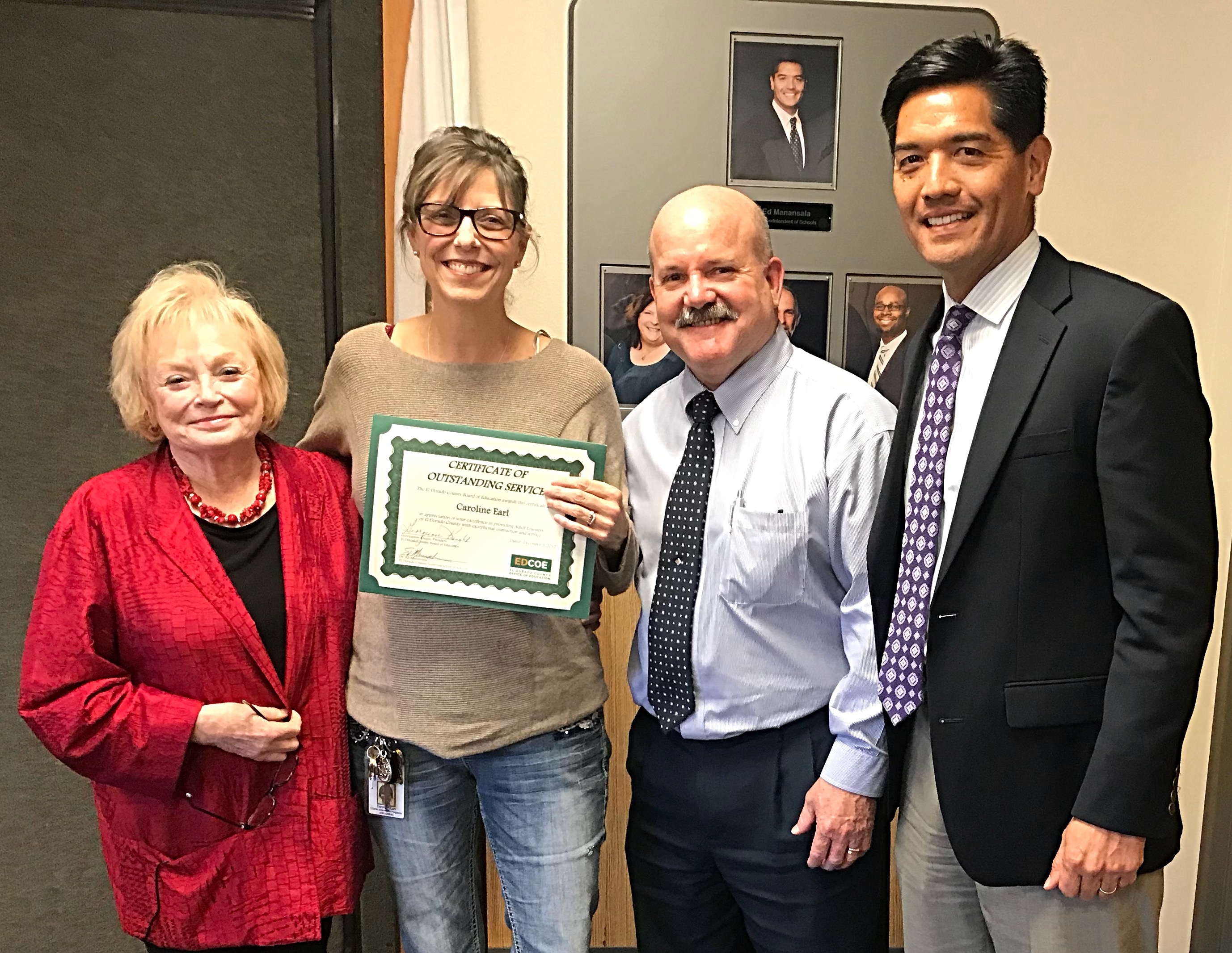 Board President, Georgianne Knight; honoree Caroline Earl; Charter Alternative Programs Executive Director, David Publicover; and County Superintendent of Schools, Ed Manansala