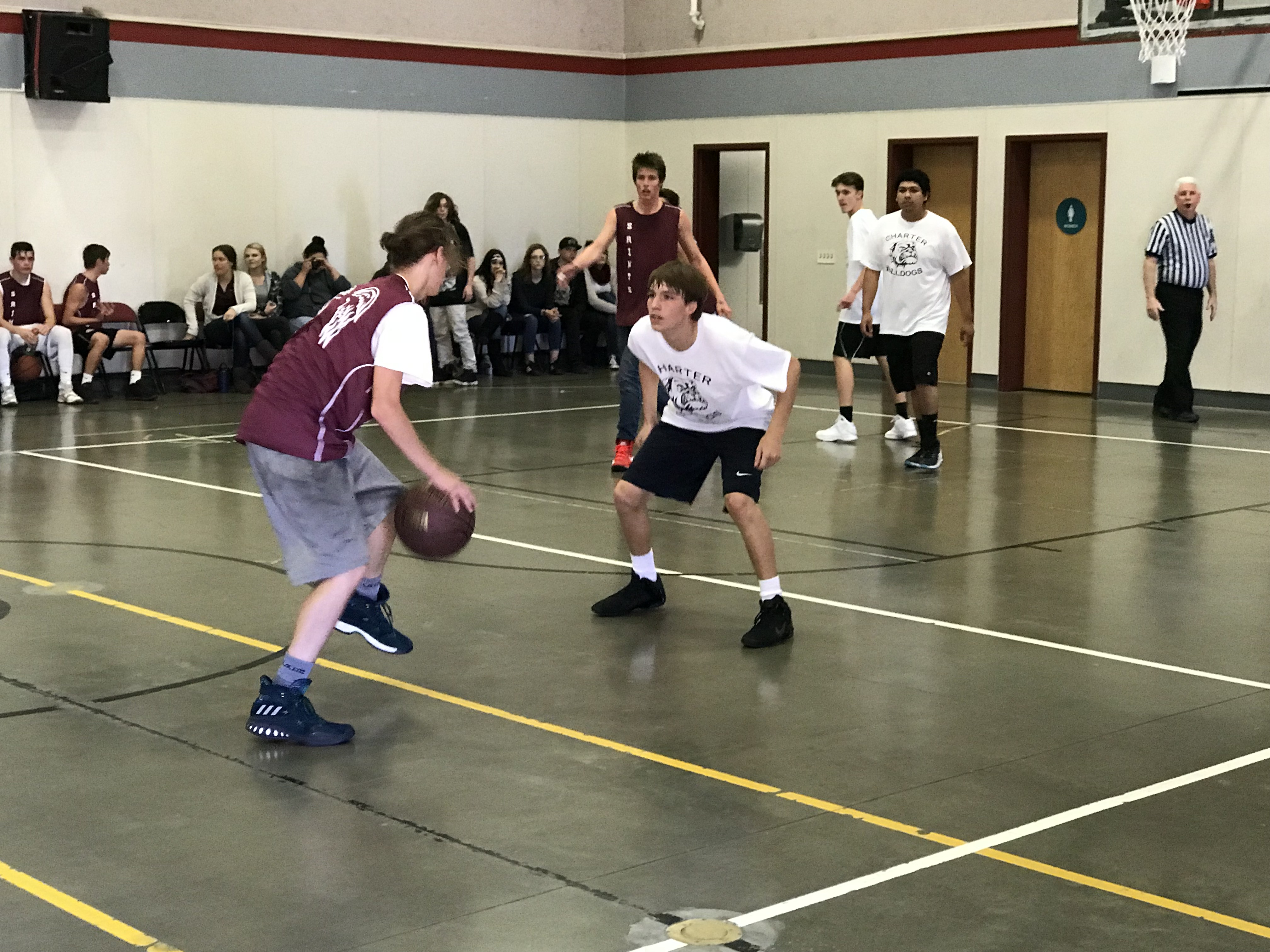 Charter College & Career Prep students (left to right) senior Julian Mancilla, junior Jacob Tudor, and senior David Garcia-Reyes displaying their defensive skills.