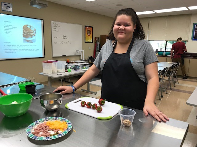 Noelle Green displays her ingredients during a breakfast preparation in Culinary Arts class